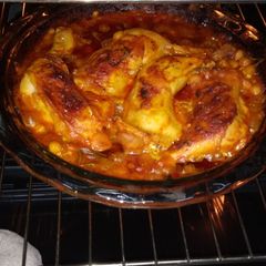 A picture of Chicken with chickpeas and tomatoes.