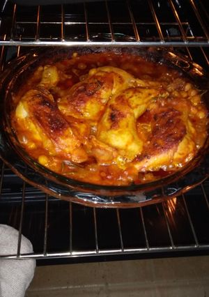 A picture of Chicken with chickpeas and tomatoes.