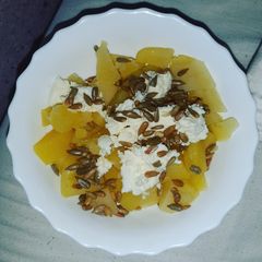 A picture of Cooked Potatoes with Sheep's Cottage cheese.