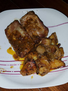 Una foto de Costillas con guarnición a la provenzal