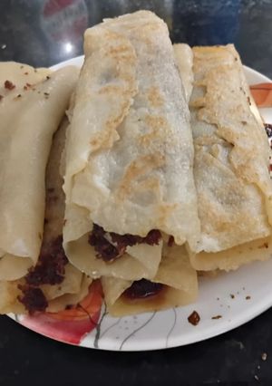 A picture of Sooji(Semolina) Patisapta - Coconut stuffed Bengali style.