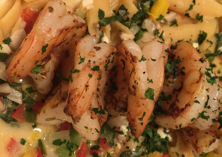 Cajun grilled shrimp with loaded veggie Alfredo noodles Cajun grilled shrimp with loaded veggie Alfredo noodles