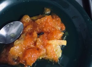 Una foto de Dulce de tripas de calabaza y naranja