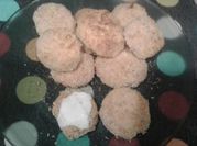 Una foto de nuggets de pollo con cereal