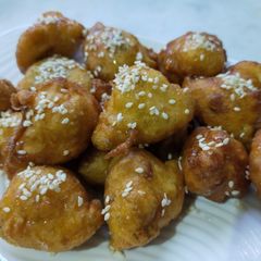 A picture of Sweet pakoray with dry fruits/ sweet fritters.