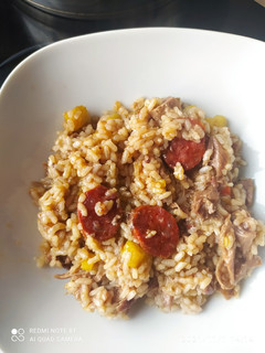 Una foto de Arroz de pato y boniato