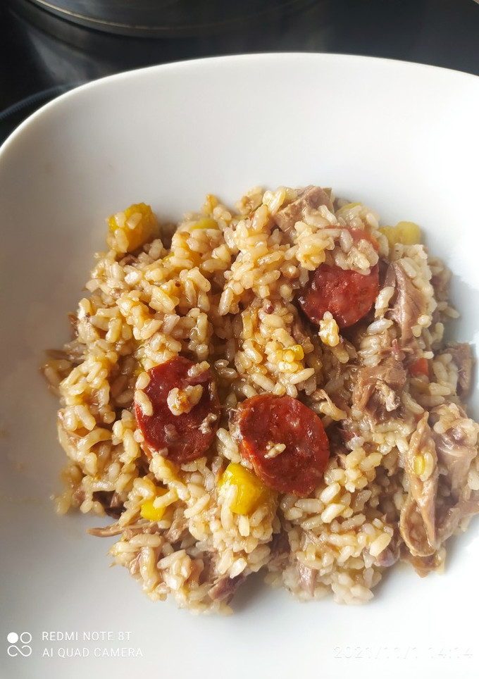 Una foto de Arroz de pato y boniato
