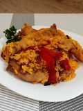 Arroz con patas mollejas y cuellos de pollo