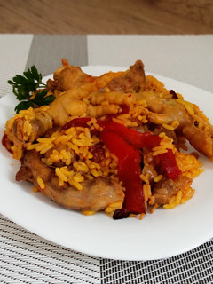 Una foto de Arroz con patas mollejas y cuellos de pollo