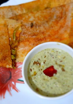 A picture of Stuffed Rava Dosa with shezwan twist.