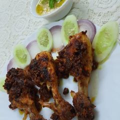 Leg piece fry with Hummus A picture of Leg piece fry with Hummus.
