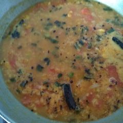 A picture of Mashoor dal with spring onion.