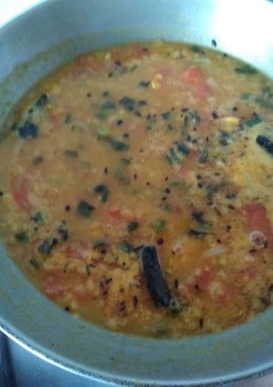 A picture of Mashoor dal with spring onion.