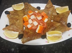 صورة لوصفة بريوات بفواكه البحر والفطر