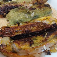 A picture of Raw mango stuffed bittergourd.