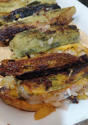 A picture of Raw mango stuffed bittergourd.