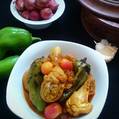 A picture of Chicken with roasted jalapeno and pickled onion.