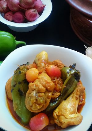 A picture of Chicken with roasted jalapeno and pickled onion.