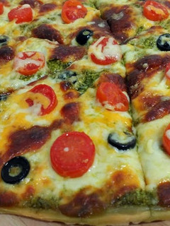 Una foto de Pizza al pesto