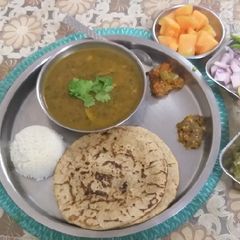 A picture of Mirchi ki dal jawari ki Roti theccha.