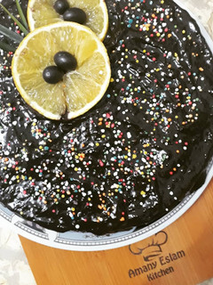صورة لوصفة كيكة شوكولاتة بالبرتقال مع مهلبية برتقال بالشوكولاتة 🍊🍫