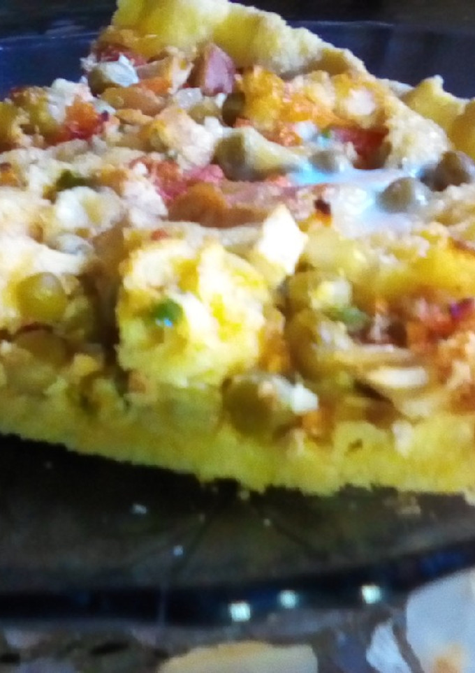 Una foto de Tarta de pollo y verduras 🐥🌶️🫛con masa de maíz🌽