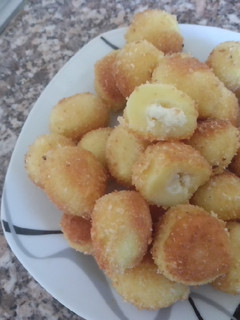 Una foto de Ñoquis de queso rebozados
