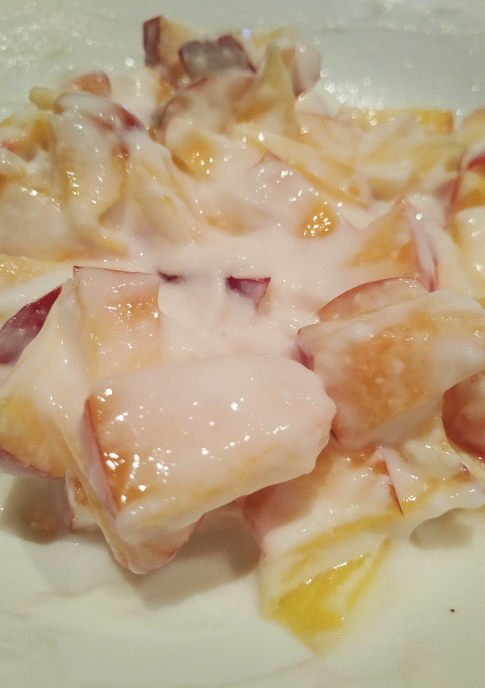 Una foto de Nectarina con queso fresco batido
