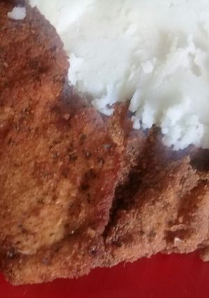 Una foto de Milanesa de pollo crocante con zatar
