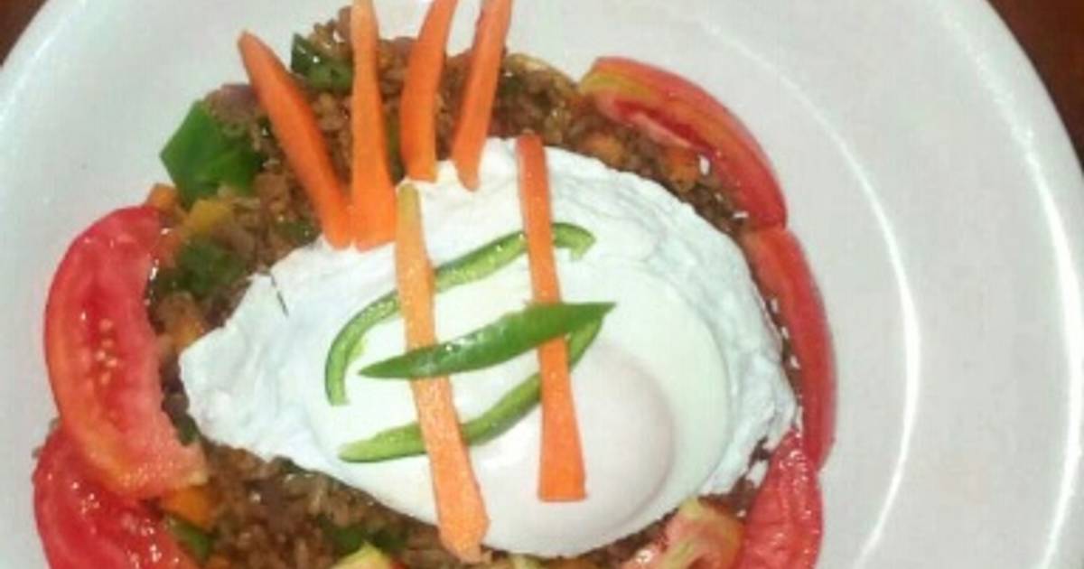 Garnished Jollof Rice Recipe by Steve wealth abah Cookpad