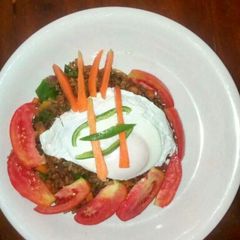 A picture of Garnished Jollof Rice.