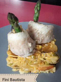Una foto de Arroz con dorada