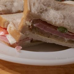 A picture of My leftovers ham and stuffing sandwich.