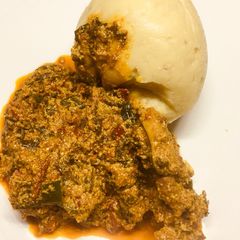 A picture of Pounded yam with egusi soup.