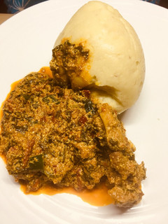 A picture of Pounded yam with egusi soup.