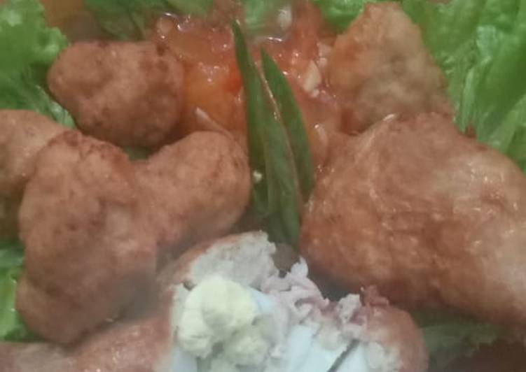 Paha ayam isi telor puyuh