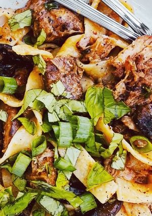 A picture of Braised Pork Ragù w/ Mushrooms & Tagliatelle.
