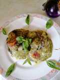 Parmigiana di melanzane al pesto e scamorza affumicata