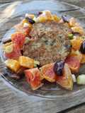 Frittelle di neonata di pesce con insalata di arance
