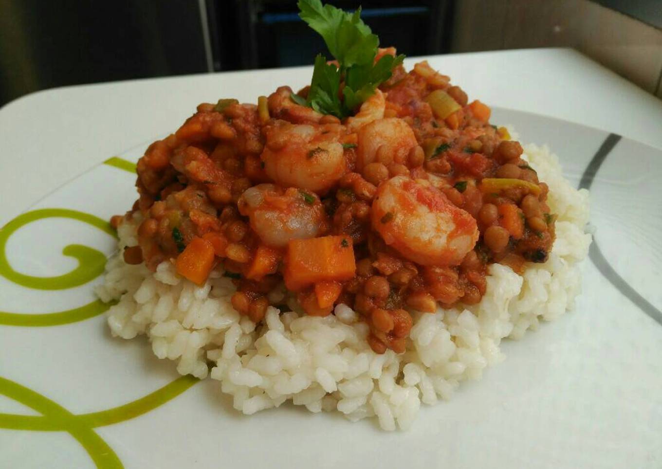 Lentejas con gambas y pulpo con arroz