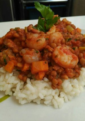 Una foto de Lentejas con gambas y pulpo con arroz