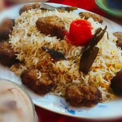 A picture of Seekh kabab pulao.