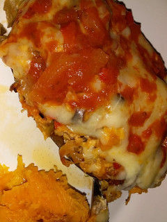 Una foto de Berenjena rellena de pollo a la napolitana