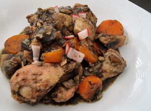 Una foto de Coq au Vin mexicano