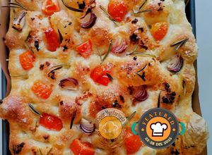 Gambar Focaccia With Shallot Wedges, Aromatic Fried Garlic, Diced Tomato & Rosemary