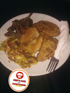 A picture of Fried yam & Egg wif cabbage sauce.