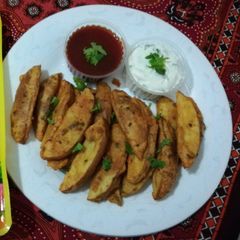 A picture of Potato Wedges.
