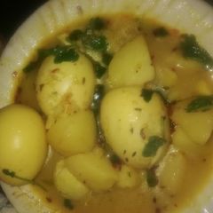 A picture of Egg potatoes gravy.