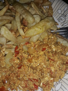 A picture of Scrambled eggs with Irish potatoes.