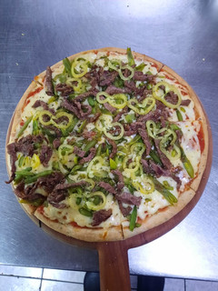Una foto de Pizza al estilo chacarero